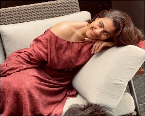 Kajol looks simple yet elegant in her super comfy brick brick-red dress